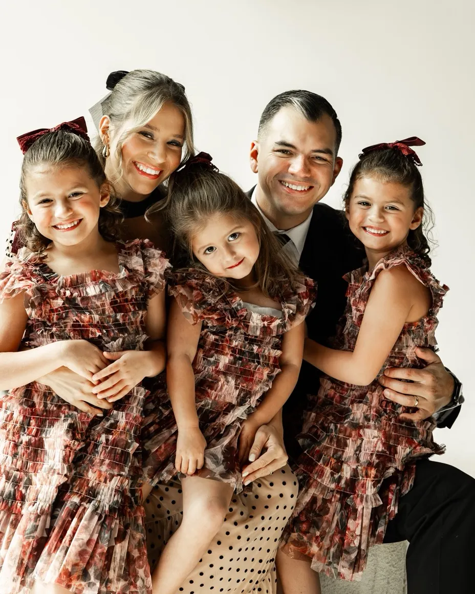 Carlos Bedoya with his wife and three daughters
